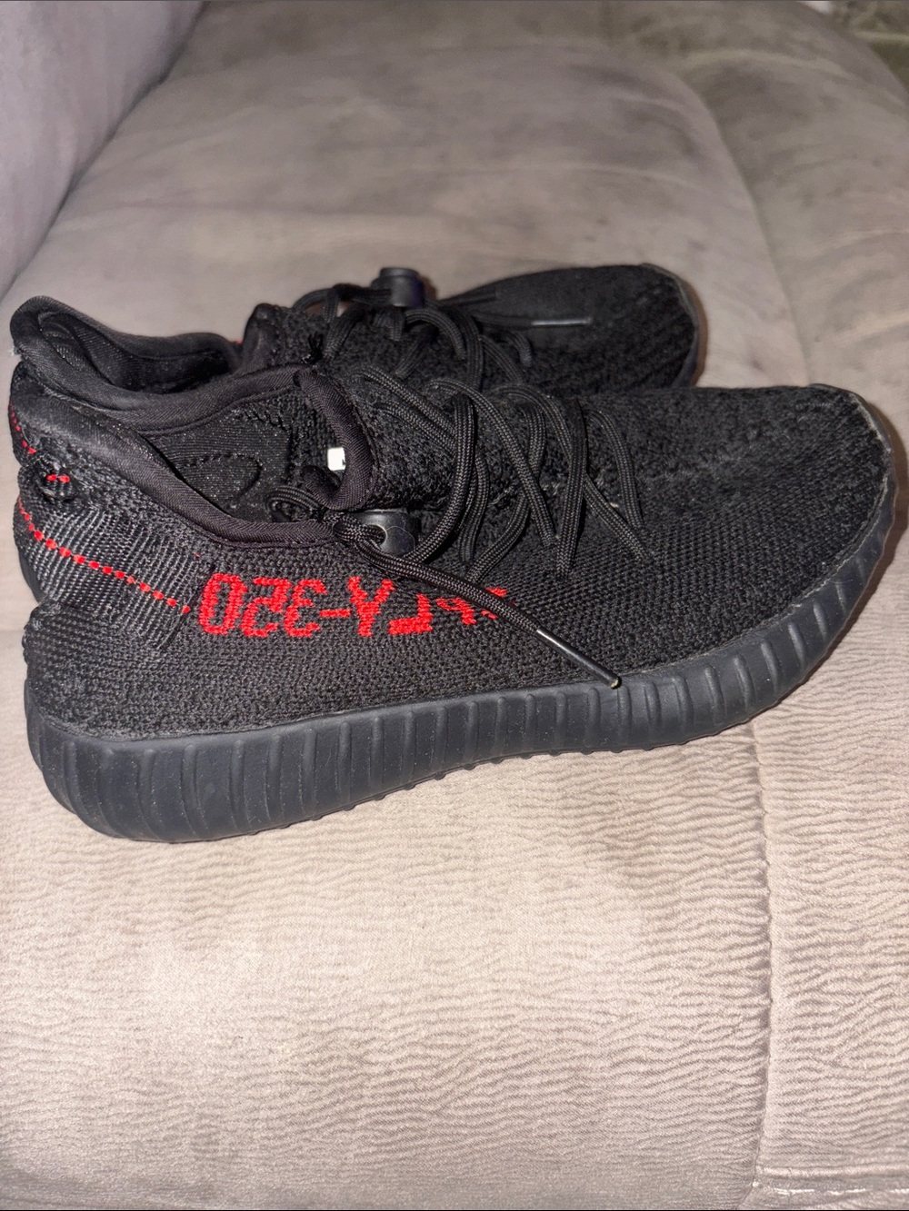 Yeezy Kids Black Sneakers with Red Accent